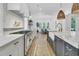 Bright kitchen featuring marble countertops, a large stove with range hood, and a farmhouse style sink at 3864 Summerton St, Mount Pleasant, SC 29466