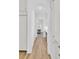 Hallway with bright white custom cabinets and drawers leading to a view of the dining room at 3864 Summerton St, Mount Pleasant, SC 29466