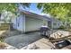 View of a backyard featuring a large grill, vinyl siding and an air conditioning unit at 406 Carolina Cir, Ladson, SC 29456