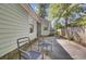 Side view of a backyard featuring a seating area and a wooden fence at 406 Carolina Cir, Ladson, SC 29456