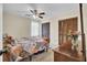 Cozy bedroom featuring a ceiling fan and ample closet space for storage at 406 Carolina Cir, Ladson, SC 29456