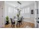 Dining room with chandelier, table, chairs, hardwood floor and light from window at 413 Eagleview Dr, Moncks Corner, SC 29461