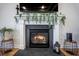 Close-up of the fireplace with decorative mantel, gas logs, and hearth at 413 Eagleview Dr, Moncks Corner, SC 29461