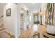 Hallway with a laundry room, stylish decor, and access to other areas of the home at 413 Eagleview Dr, Moncks Corner, SC 29461