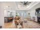 Cozy living room featuring a modern fireplace, stylish furniture, and natural light at 413 Eagleview Dr, Moncks Corner, SC 29461