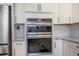 Stainless steel double ovens are installed in the kitchen's white cabinetry at 413 Eagleview Dr, Moncks Corner, SC 29461