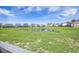 Scenic view of the pond and surrounding neighborhood from the property's back yard at 413 Eagleview Dr, Moncks Corner, SC 29461