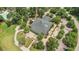 Stunning aerial view of the Coosaw Creek Clubhouse surrounded by manicured lawns and lush landscaping at 4227 Sawgrass Dr, North Charleston, SC 29420