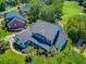 Overhead view of a large house with a meticulously landscaped yard and access to a golf course at 4227 Sawgrass Dr, North Charleston, SC 29420