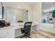 This bathroom has a vanity with a large mirror and a walk-in closet with shelving at 4227 Sawgrass Dr, North Charleston, SC 29420