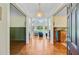 Grand foyer with hardwood floors, elegant lighting, and view into the spacious living areas at 4227 Sawgrass Dr, North Charleston, SC 29420