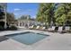 Inviting pool area with lounge chairs and a gazebo, perfect for relaxation and outdoor enjoyment at 4227 Sawgrass Dr, North Charleston, SC 29420