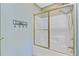 This shower features a glass door, a rainfall shower head, and a 'Towels' sign at 4227 Sawgrass Dr, North Charleston, SC 29420