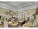 Cozy sitting area with comfortable sofas, chairs, and stylish decor for relaxing or socializing at 4227 Sawgrass Dr, North Charleston, SC 29420