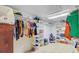 The walk-in closet has built-in shelves, hanging rods, and ample storage space at 4227 Sawgrass Dr, North Charleston, SC 29420