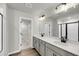 Primary bathroom featuring double sinks, modern fixtures, and a large mirror with great lighting at 4308 Cotton Flt Rd, Summerville, SC 29485