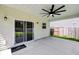 Covered patio with ceiling fan, sliding glass door, and view of fenced backyard at 4308 Cotton Flt Rd, Summerville, SC 29485