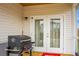 The covered patio offers a shady retreat for outdoor enjoyment, complete with a grill at 513 Donnas View Way, Summerville, SC 29486