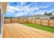 Enjoy the spacious wooden deck and green lawn in a secluded backyard setting at 513 Donnas View Way, Summerville, SC 29486
