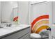 A well-lit bathroom features a modern sink and stylish shower curtain at 513 Donnas View Way, Summerville, SC 29486