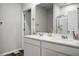 This bathroom features double sinks with a large mirror, a walk-in shower, and modern fixtures at 513 Donnas View Way, Summerville, SC 29486