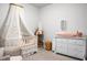 A serene Bedroom area includes a crib, changing table and storage at 513 Donnas View Way, Summerville, SC 29486