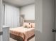 Cozy bedroom with stylish decor, rainbow pillow, and comfortable furnishings at 513 Donnas View Way, Summerville, SC 29486
