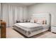 This bedroom features a neutral palette, creating a serene atmosphere, complete with stylish, modern furnishings at 513 Donnas View Way, Summerville, SC 29486