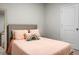 Comfortable bedroom featuring a queen size bed, accent pillow and great natural light at 513 Donnas View Way, Summerville, SC 29486