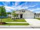This inviting single-Gathering home boasts a pristine lawn, a two-car garage, and welcoming front porch at 513 Donnas View Way, Summerville, SC 29486