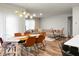 Living area with a view of dining room, comfortable seating, and bright natural light at 513 Donnas View Way, Summerville, SC 29486