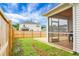 Relaxing screened-in porch offers a view of the spacious wooden deck and backyard at 513 Donnas View Way, Summerville, SC 29486