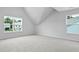 Bright bedroom with plush carpeting and natural light from two windows at 517 Yukon Ct, Summerville, SC 29485