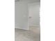 Clean hallway with neutral carpet and white trim, leading to other rooms at 517 Yukon Ct, Summerville, SC 29485