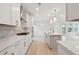 Modern kitchen with stainless steel appliances, granite countertops, a center island, and pendant lighting at 754 Minton Rd, Charleston, SC 29414