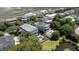 Aerial view of lovely homes with beautiful backyard pools, landscaping, and mature trees at 764 Post Oak Dr, Mount Pleasant, SC 29464