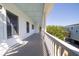 Spacious balcony with classic white railings and a relaxing outdoor view at 764 Post Oak Dr, Mount Pleasant, SC 29464