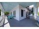Charming balcony features a blue ceiling, white railing and a black spiral staircase at 764 Post Oak Dr, Mount Pleasant, SC 29464