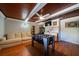Finished basement offers a cozy seating area, foosball table, and entertainment options at 764 Post Oak Dr, Mount Pleasant, SC 29464