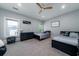 Bedroom featuring two twin beds, carpeted floors, ceiling fan and neutral colored walls at 764 Post Oak Dr, Mount Pleasant, SC 29464