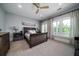 Spacious bedroom with a queen size bed, carpeted floors, ceiling fan and bright natural light at 764 Post Oak Dr, Mount Pleasant, SC 29464