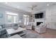 Cozy living room featuring a fireplace, built-ins, and comfortable seating area at 764 Post Oak Dr, Mount Pleasant, SC 29464
