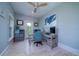 Home office with lots of natural light, a neutral-toned desk, and light hardwood floors at 764 Post Oak Dr, Mount Pleasant, SC 29464