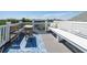 Charming rooftop deck with an outdoor table, bench, and scenic neighborhood view at 764 Post Oak Dr, Mount Pleasant, SC 29464