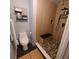 Bathroom showcasing walk-in shower, tile flooring, and modern fixtures for a spa-like experience at 7886 Racquet Rd, North Charleston, SC 29418