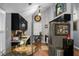Stylish kitchen featuring black cabinets, stainless steel appliances, and a cozy dining nook at 7886 Racquet Rd, North Charleston, SC 29418