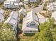 An aerial view of a charming home showcasing its metal roof and idyllic community at 7935 Flagship Ln, Johns Island, SC 29455