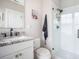 Cozy bathroom featuring a vanity with granite counters and a glass enclosed shower at 7935 Flagship Ln, Johns Island, SC 29455