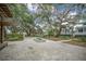 Serene courtyard with lush landscaping, charming fountain, and inviting seating areas for relaxing and socializing at 7935 Flagship Ln, Johns Island, SC 29455