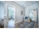 Hallway with a seating area and view into bedroom at 7935 Flagship Ln, Johns Island, SC 29455